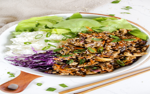Vegan San Choi Bao Crisp Lettuce Cups with Tofu, Pine Nuts, and Jicama